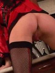 Fishnet lingerie brunette shows pussy